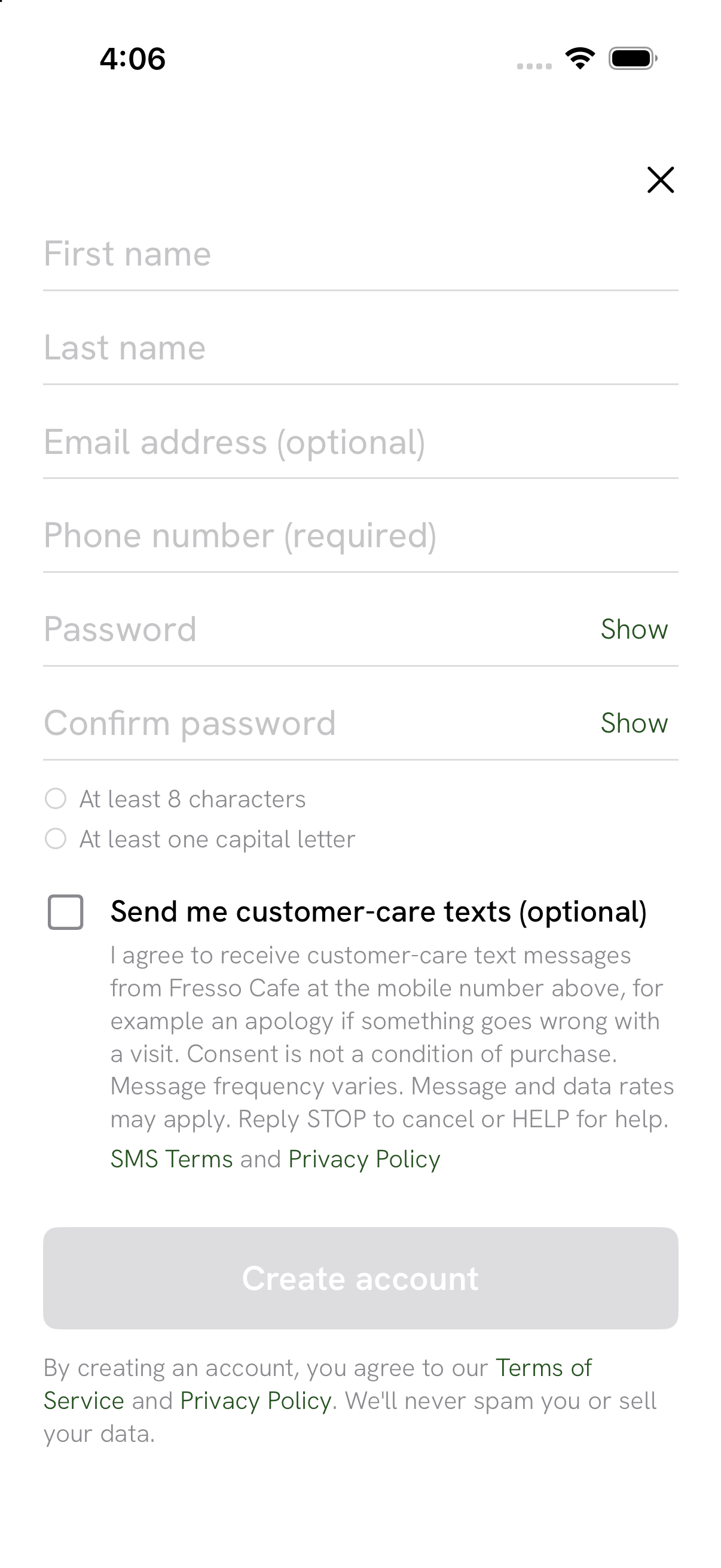 The Create your account screen of the Fresso Cafe app showing the unchecked SMS consent checkbox and its disclosure